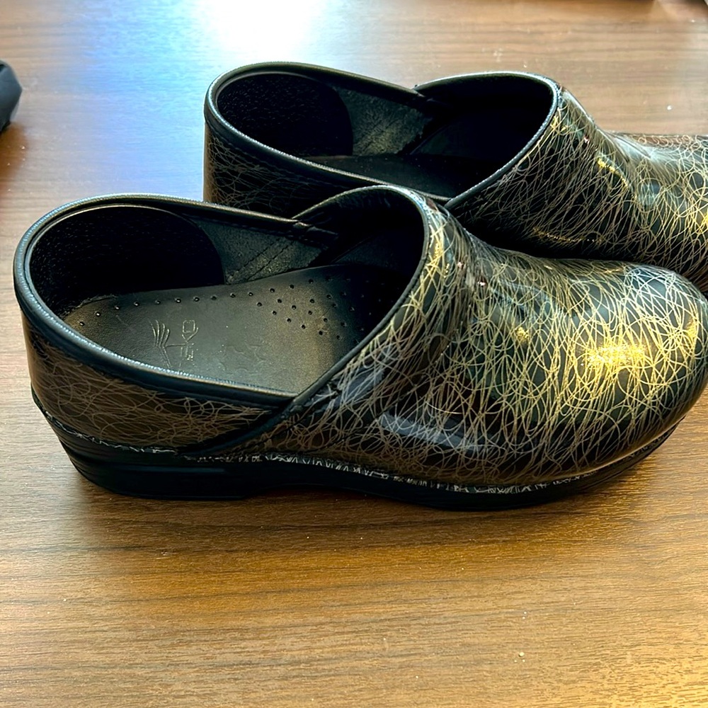 Dansko patent leather clogs